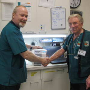 Russell Farrely of iM3 USA and Dr. Peter Emily at Houston Zoo